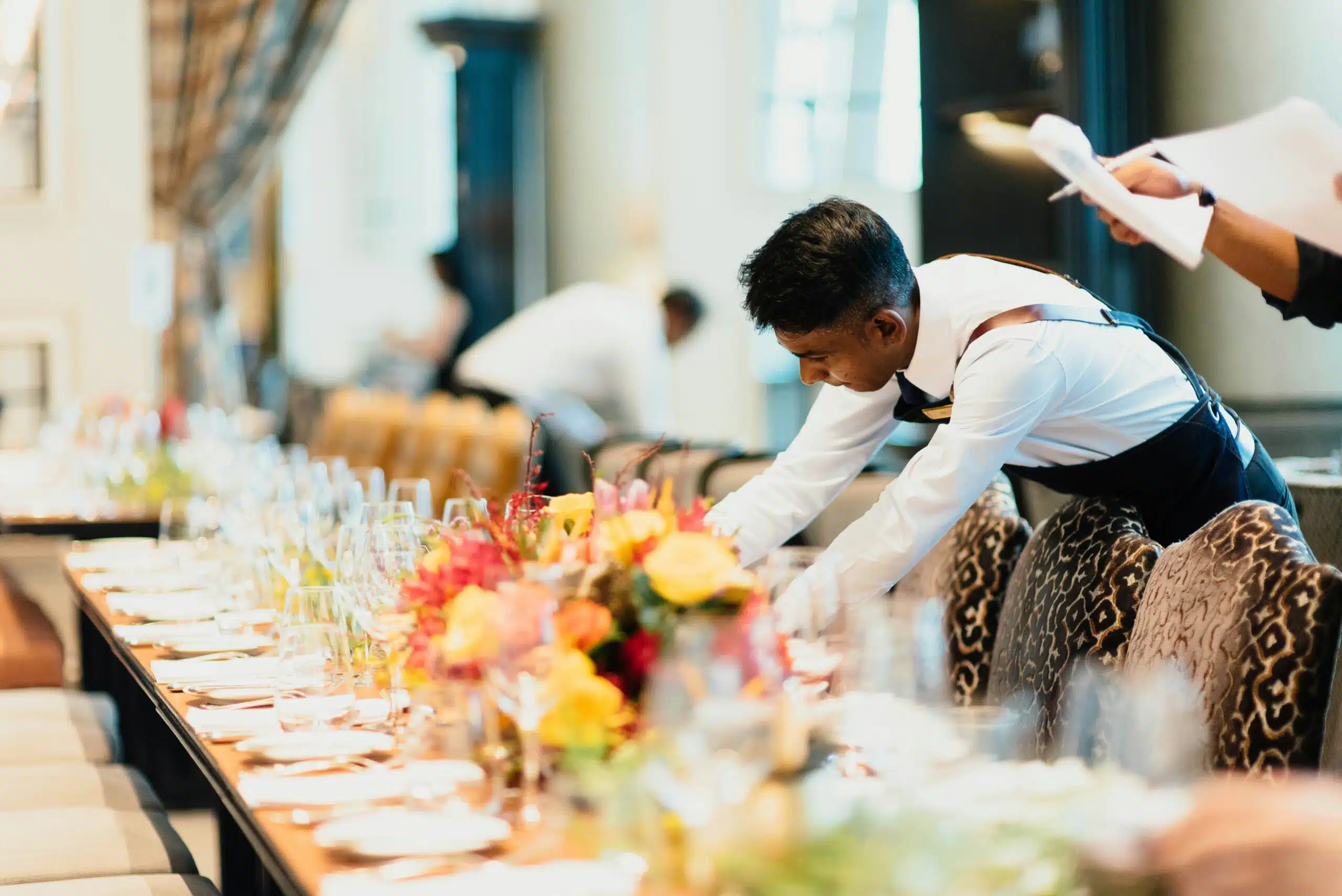 a dynamic corporate event scene showcases a diverse team confidently coordinating their roles.