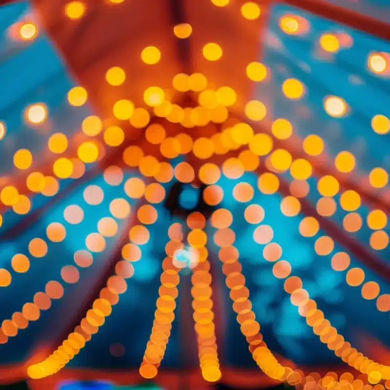 a meticulously arranged party tent setup inside a vibrant, well-lit event space showcases rigorous safety measures, with visible secure anchoring and safety signage, embodying a sense of celebration and responsibility.