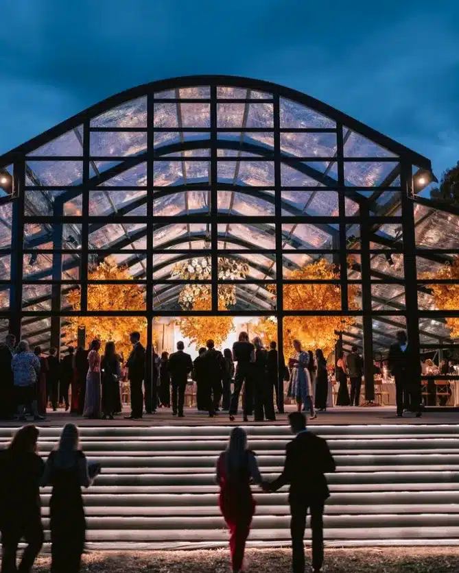 Outdoor conference tent with seating and stage