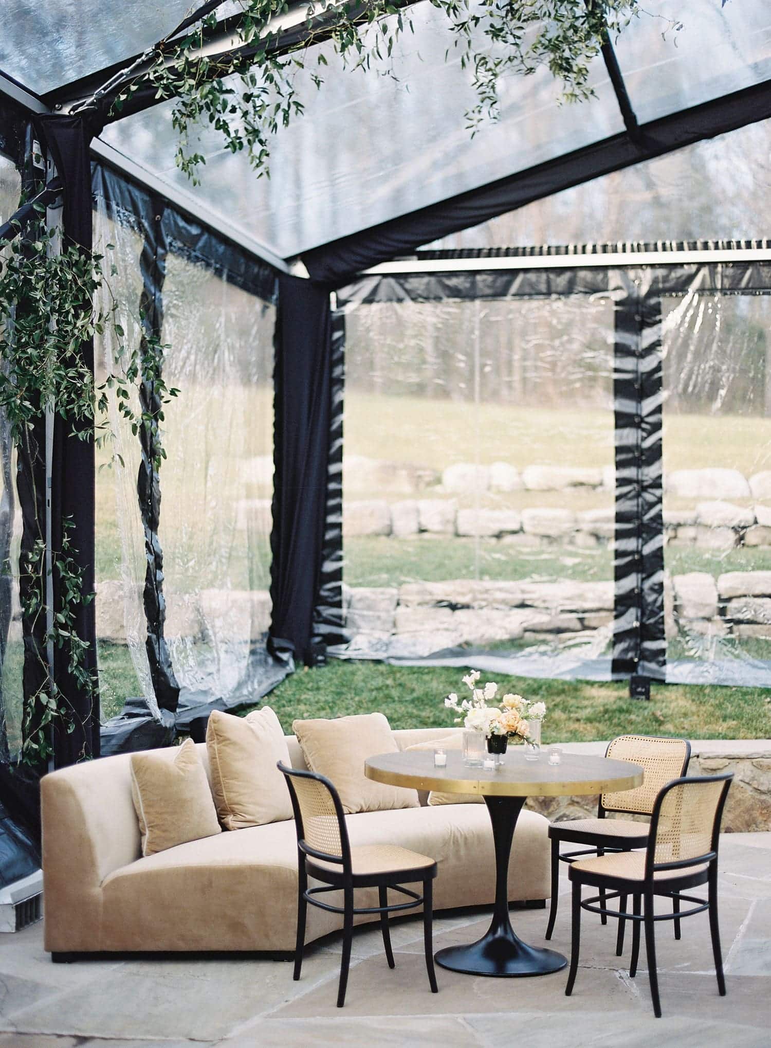 Corporate meeting setup inside luxury tent venue