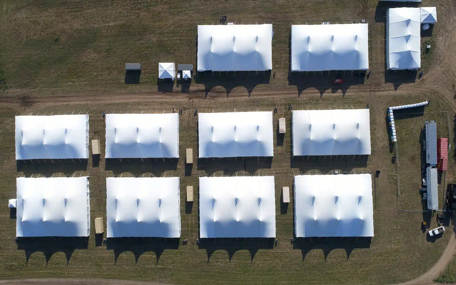 Outdoor event tent with seating layout and rental planning services