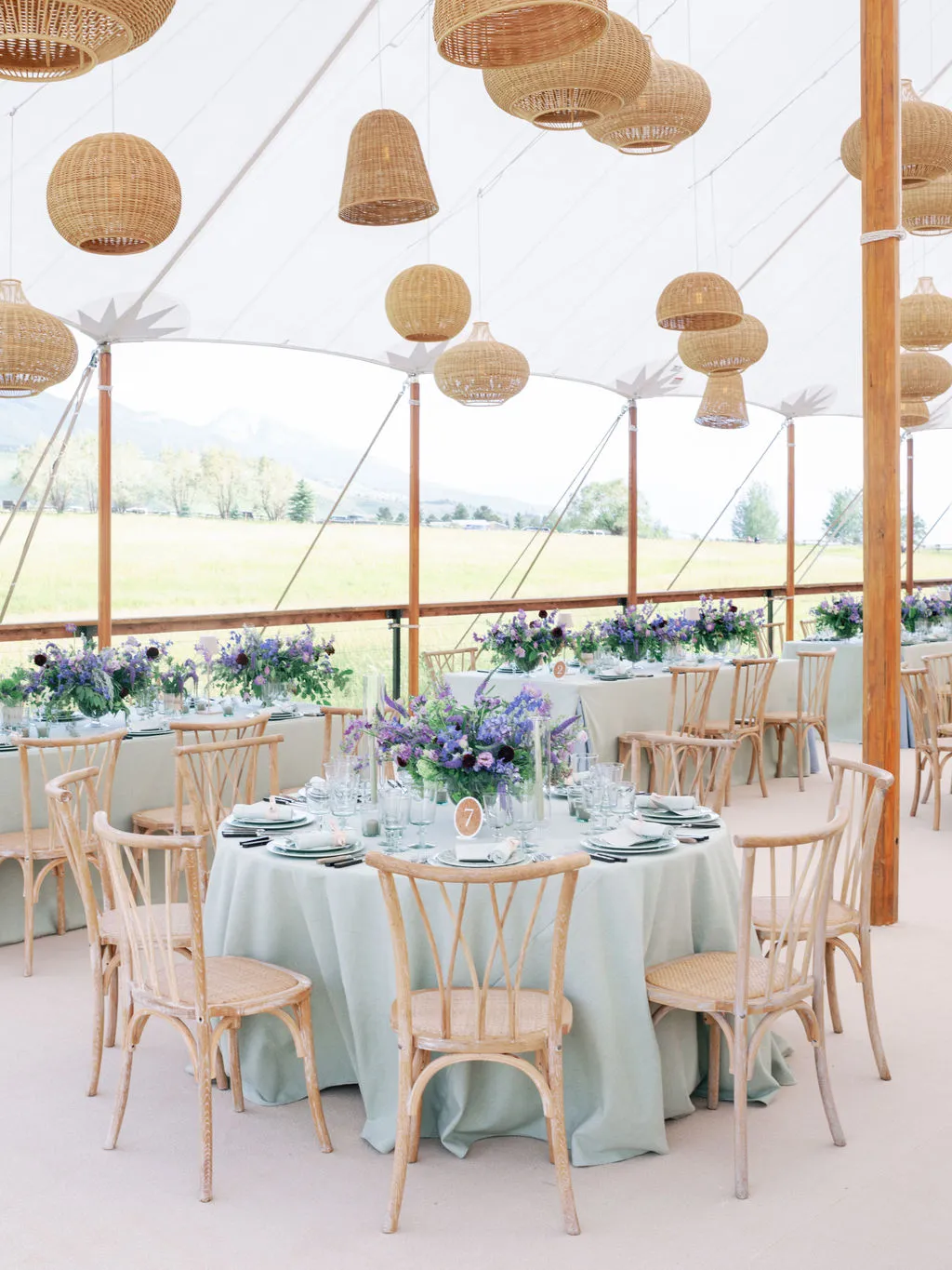 Coastal wedding tent secured with heavy-duty guy lines and anchors