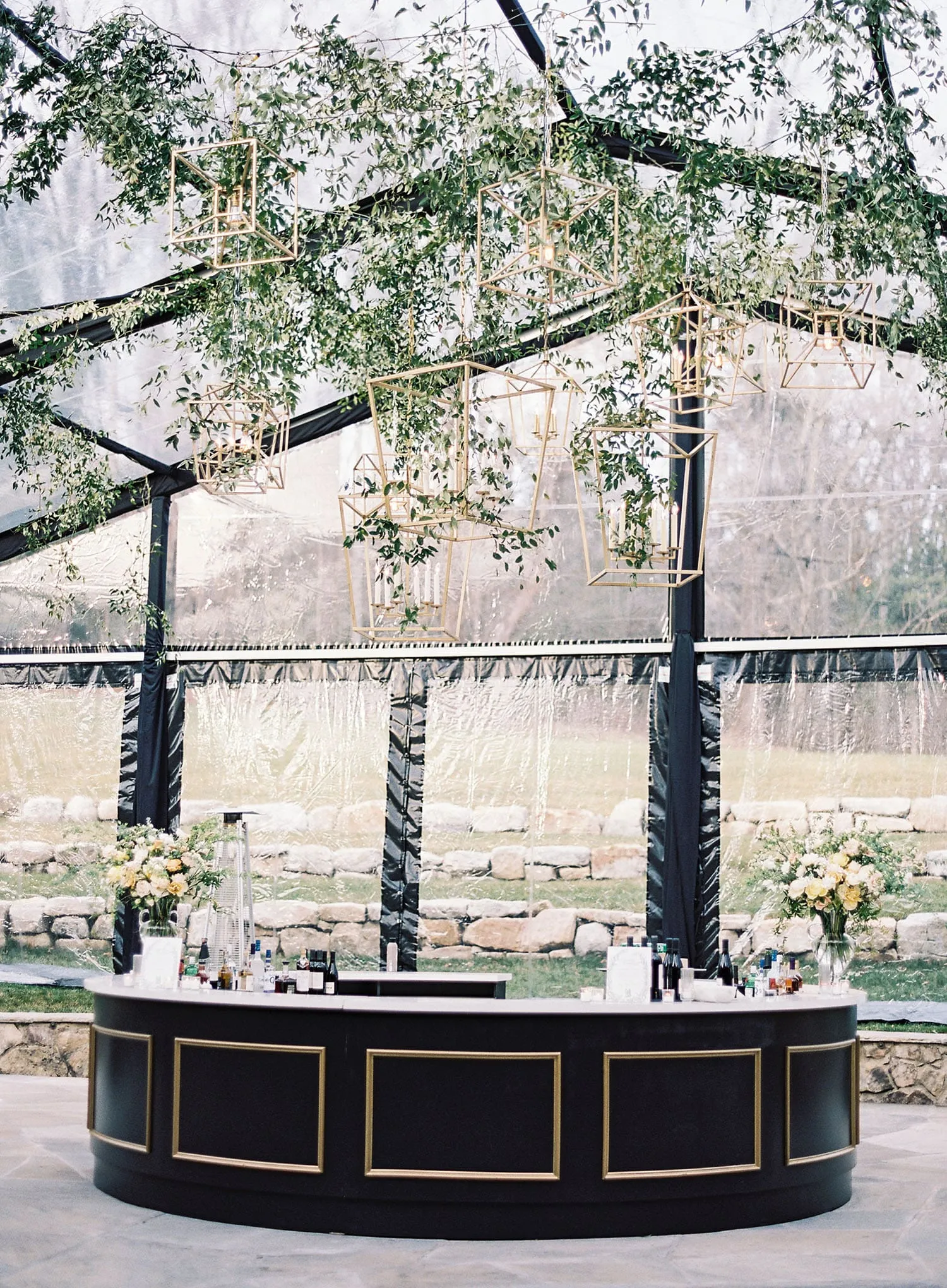 Autumn event tent with elevated flooring and colorful fall scenery